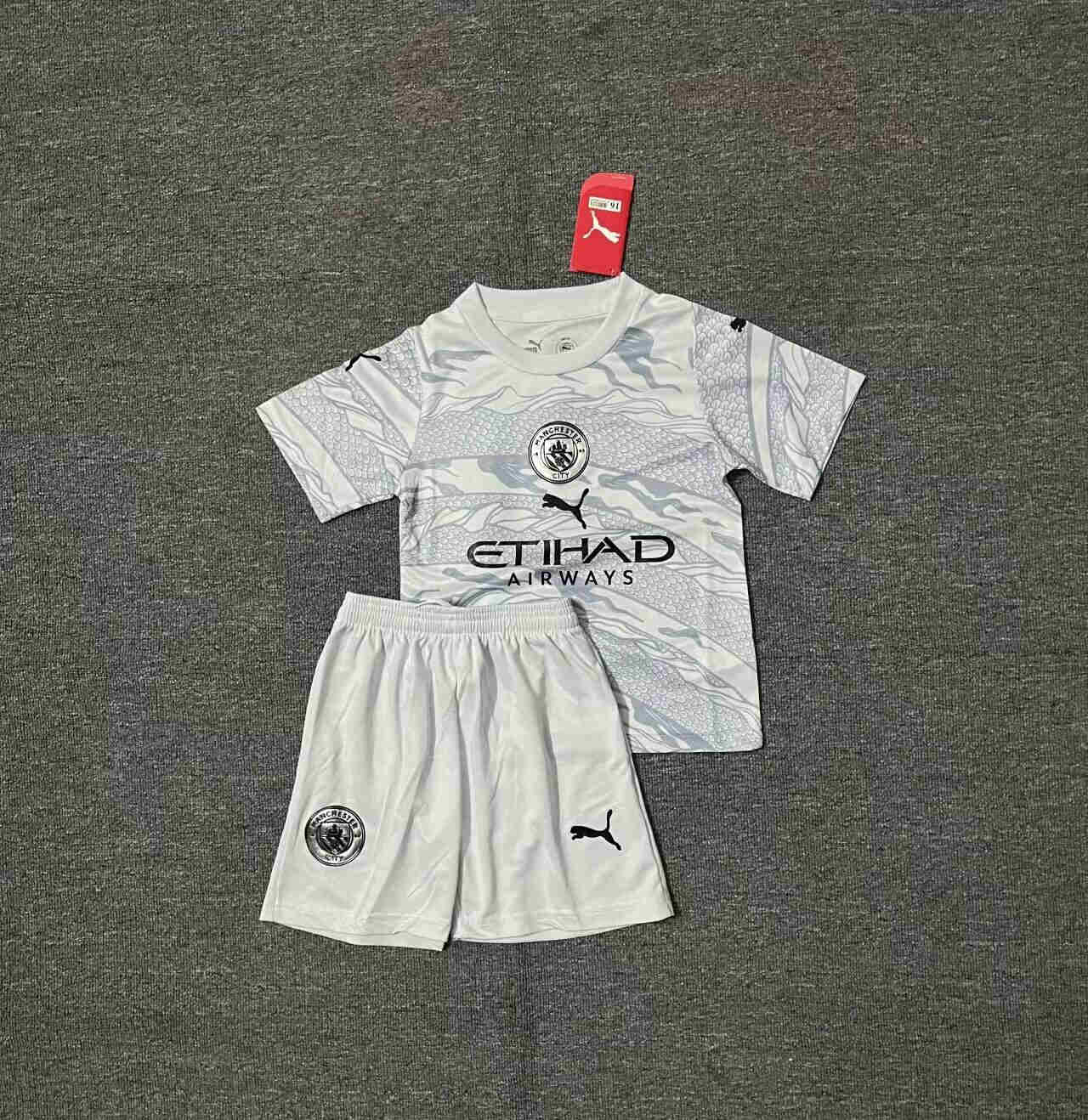 2023/2024 Manchester City away kids kit
